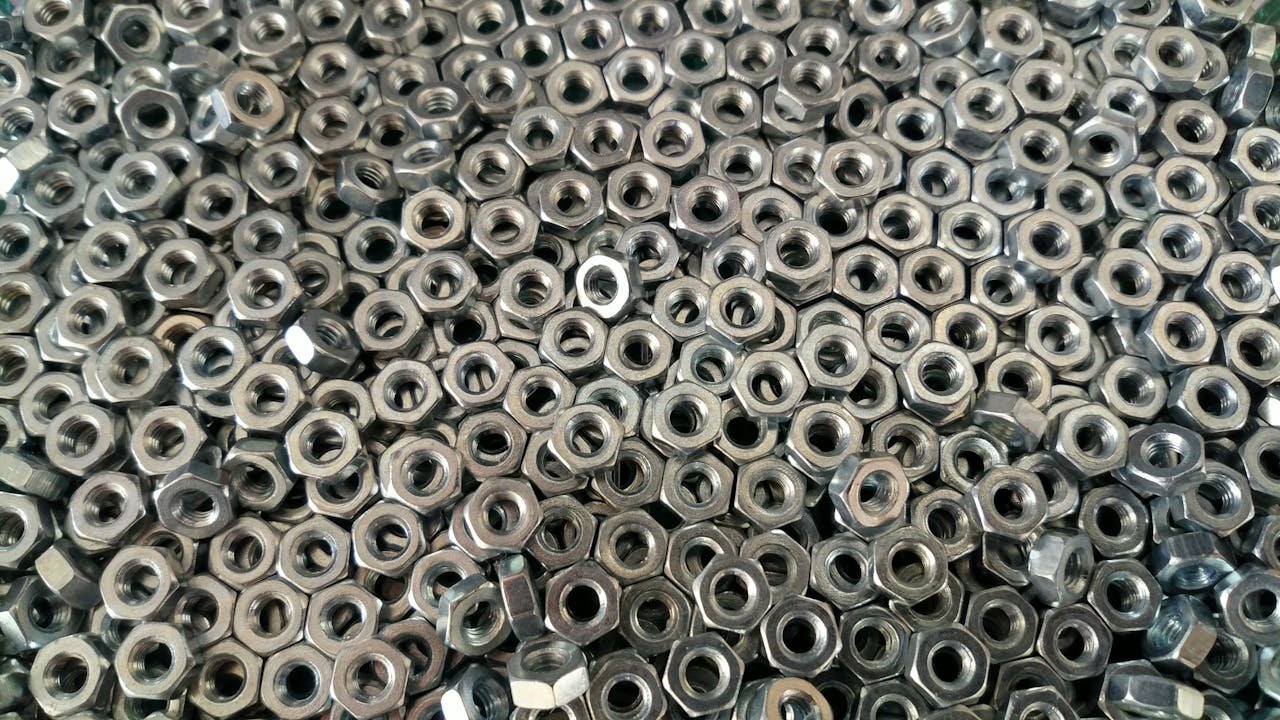 Pile of Silver Hex Nuts
